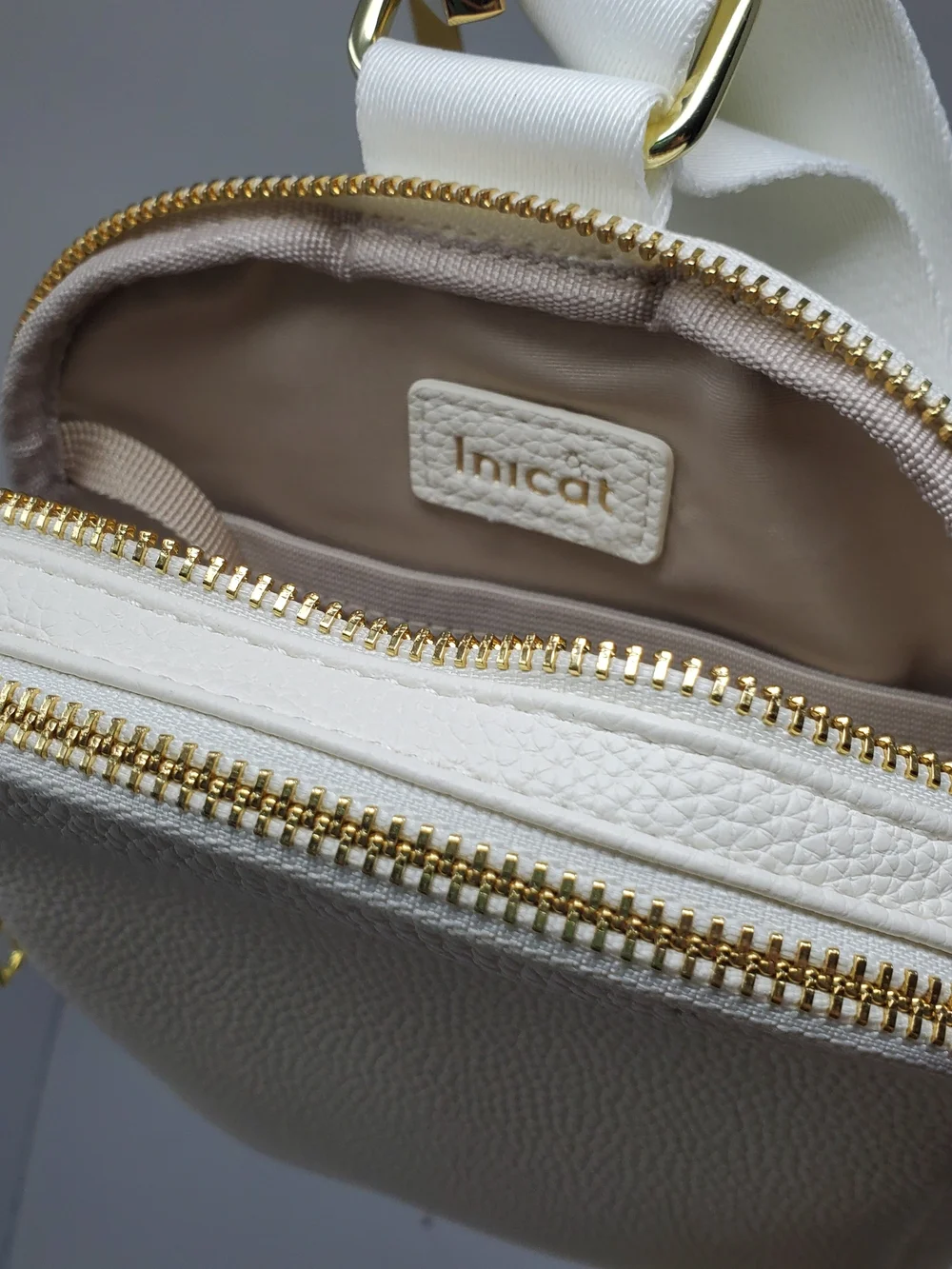 Pebbled White Leather Mini Backpack with Gold Hardware